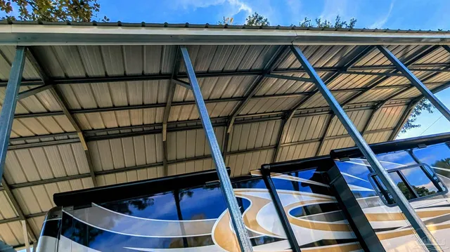 a view of a house with a flower garden