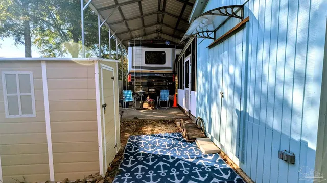 a front view of a building with garden