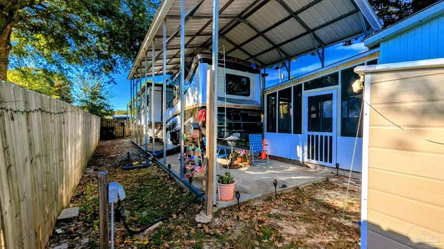 a view of a terrace with a tree
