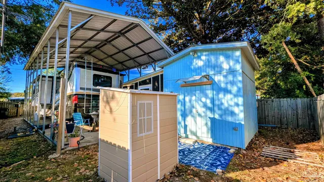 a view of a park with large trees