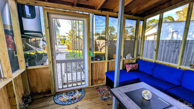 an aerial view of a house with a garden