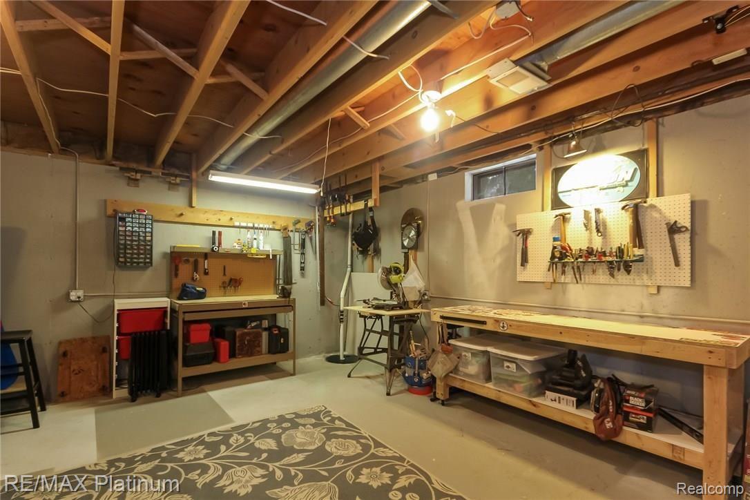 4047 Timberview Drive Howell, MI 48843 - Photo 47 of 59 Workroom, view 2. Note: Workbench is excluded