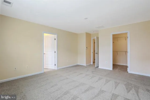 an empty room with an entryway