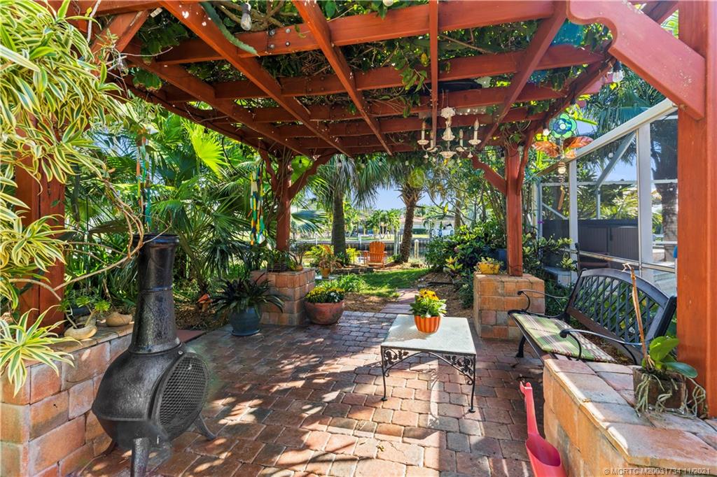 1996 Northwest Fork Road Stuart, FL 34994 - Photo 43 of 59 a view of yard with outdoor seating