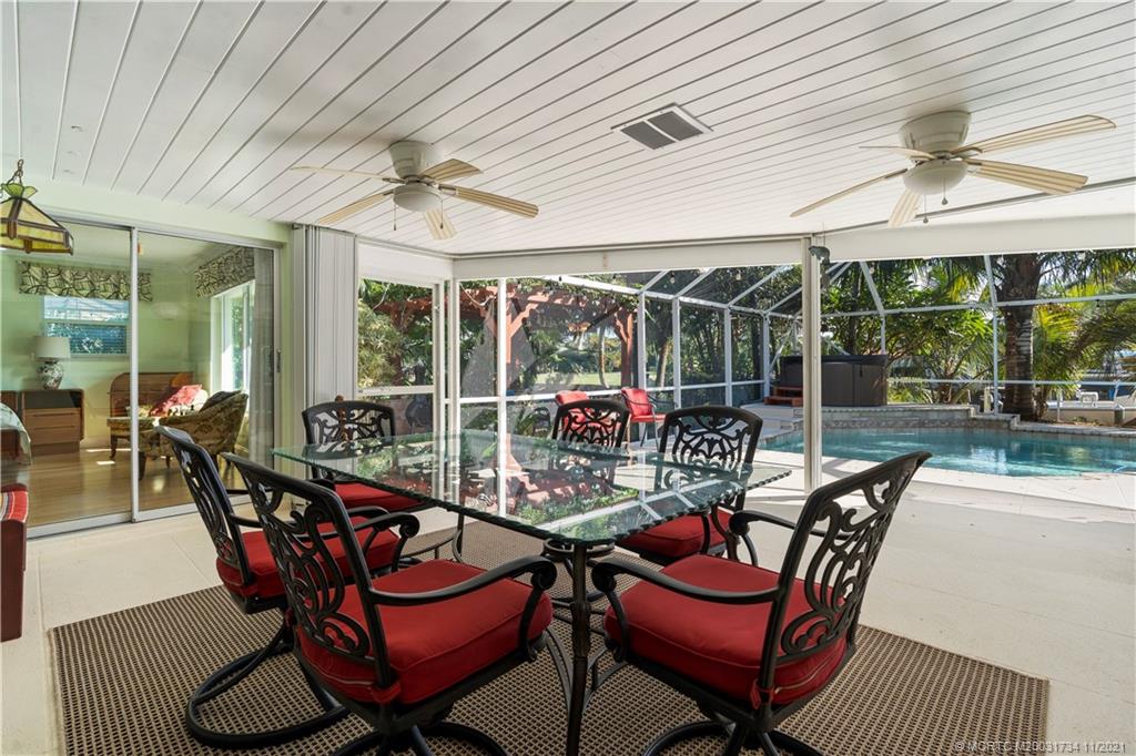 1996 Northwest Fork Road Stuart, FL 34994 - Photo 50 of 59 a outdoor space with patio lots of white furniture