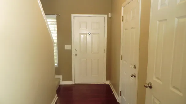 a view of a bathroom from the hallway