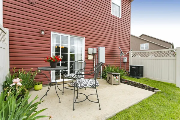 a house view with a outdoor space