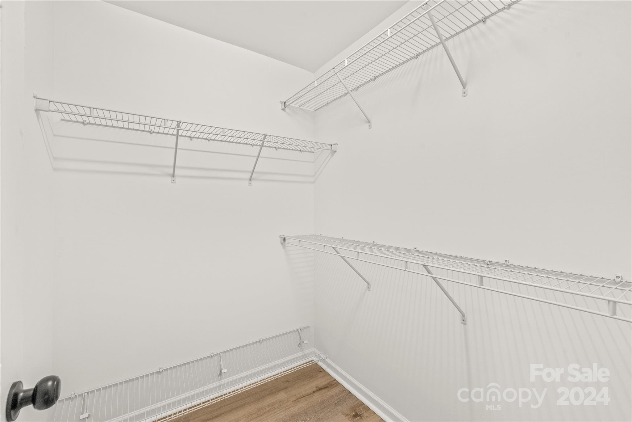 205 Snead Road Fort Mill, SC 29715 - Photo 20 of 33 a view of a room with racks on the wall