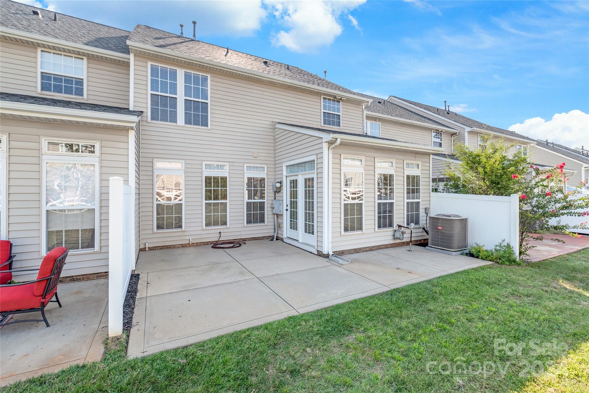 205 Snead Road Fort Mill, SC 29715 - Photo 29 of 33 a view of a house with backyard sitting area and garden