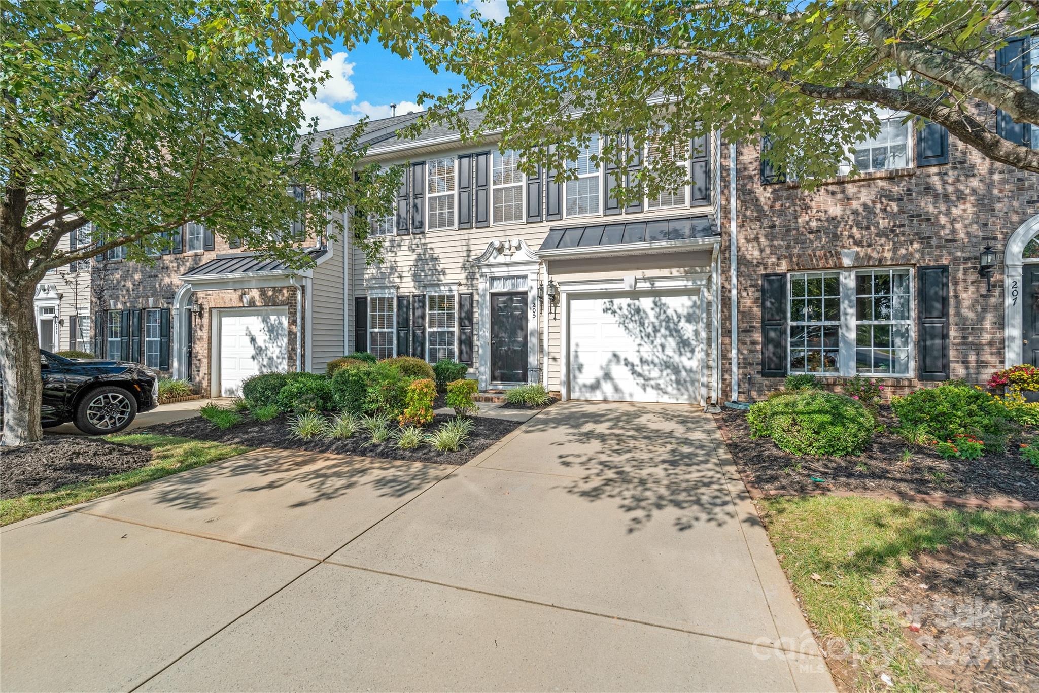 205 Snead Road Fort Mill, SC 29715 - Photo 33 of 33 a front view of a house with garden