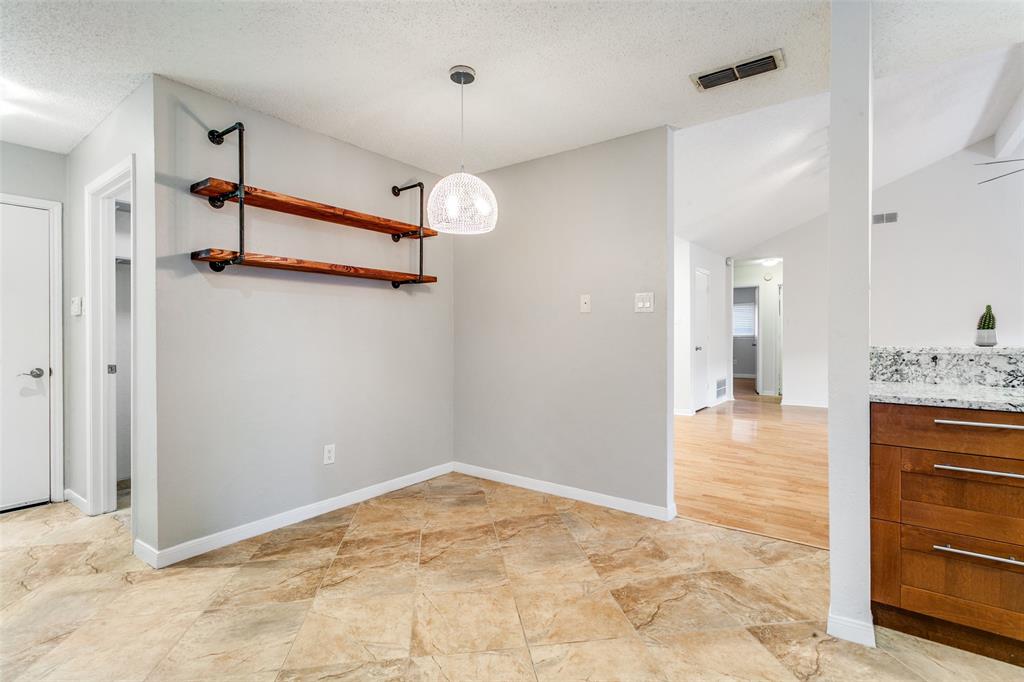 200 Lark Lane Euless, TX 76039 - Photo 13 of 25 a view of a walk in closet and bedroom