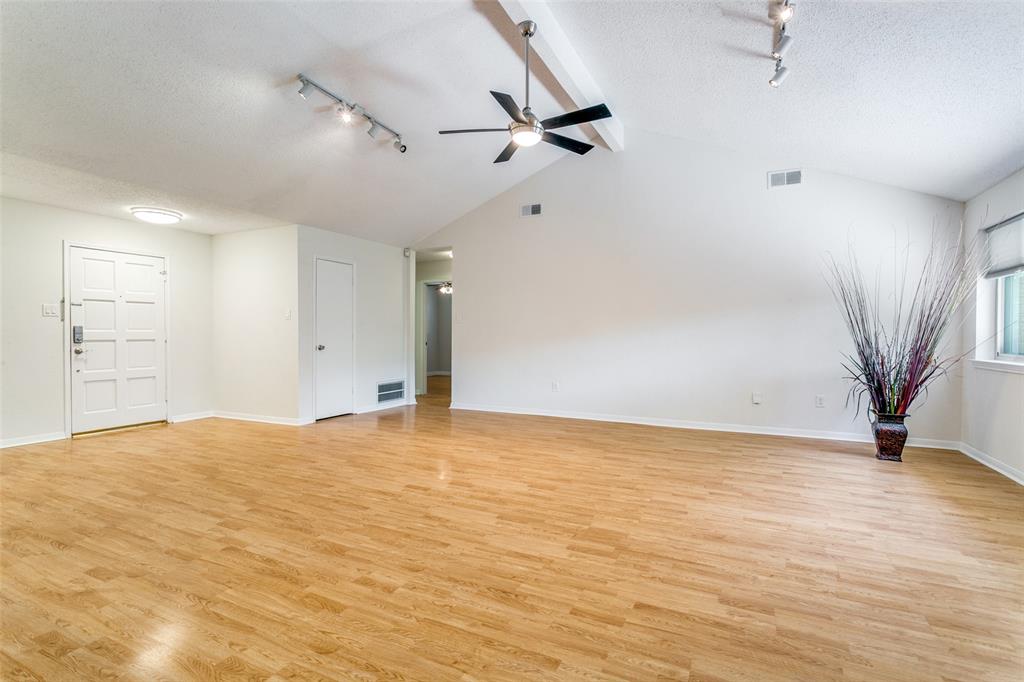 200 Lark Lane Euless, TX 76039 - Photo 6 of 25 a view of an empty room with a window