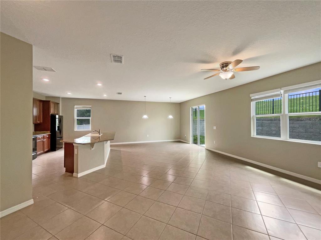 10017 Weathers Loop Clermont, FL 34711 - Photo 4 of 23 a view of an empty room with a window