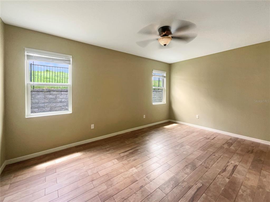 10017 Weathers Loop Clermont, FL 34711 - Photo 10 of 23 a view of an empty room with a window