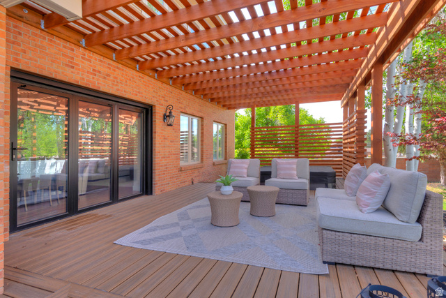 16 Gatehouse Lane Sandy, UT 84092 - Photo 20 of 73 Entertain on the walkout terrace with an outdoor living space and a pergola