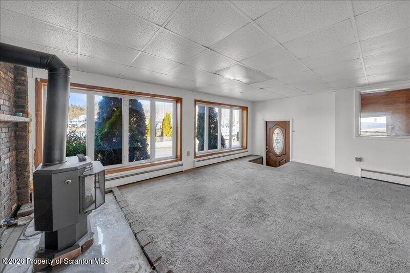 1228 Lake Road Factoryville, PA 18419 - Photo 7 of 43 a view of an empty room with a window