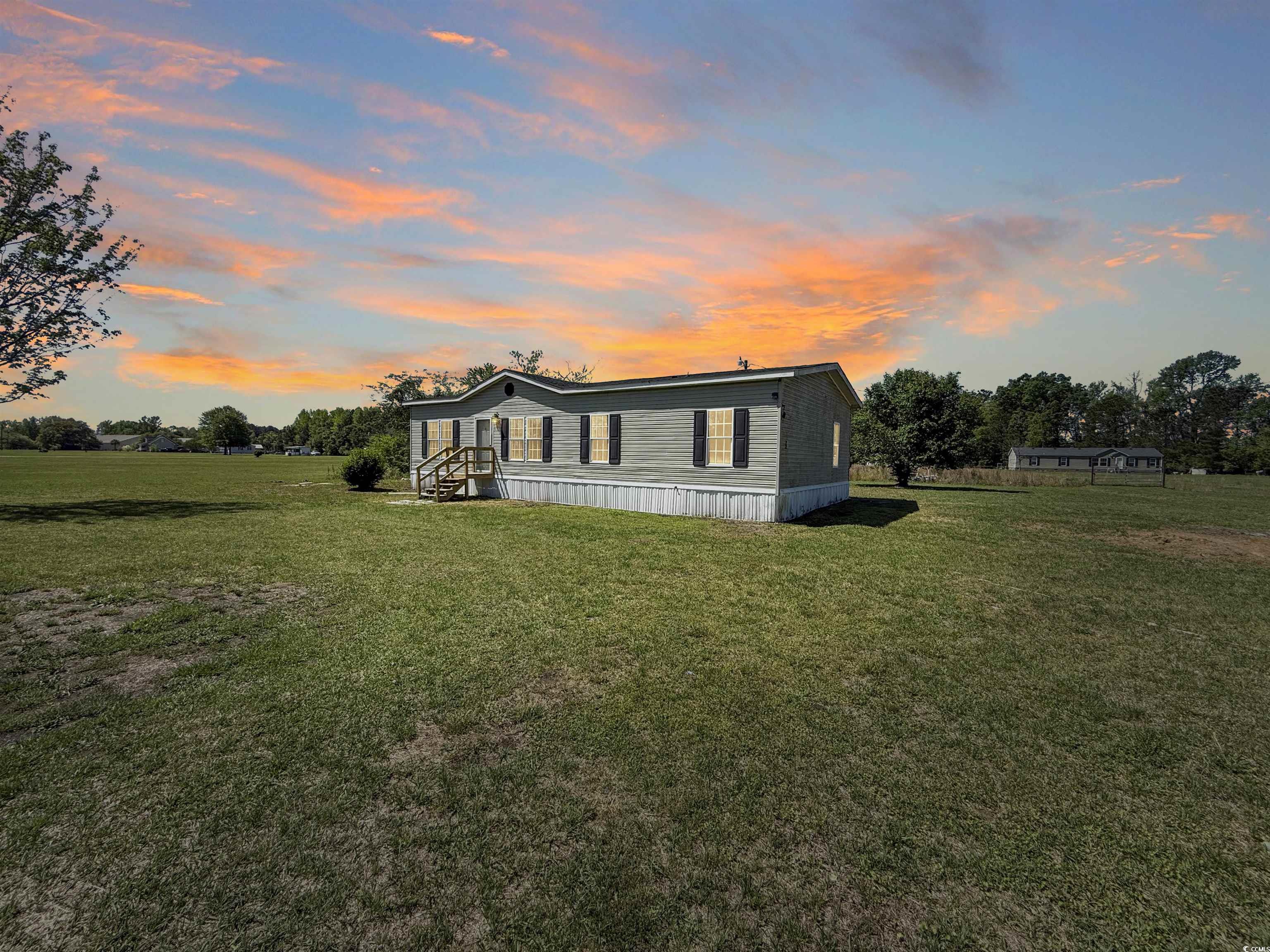 View of front of house featuring a yard