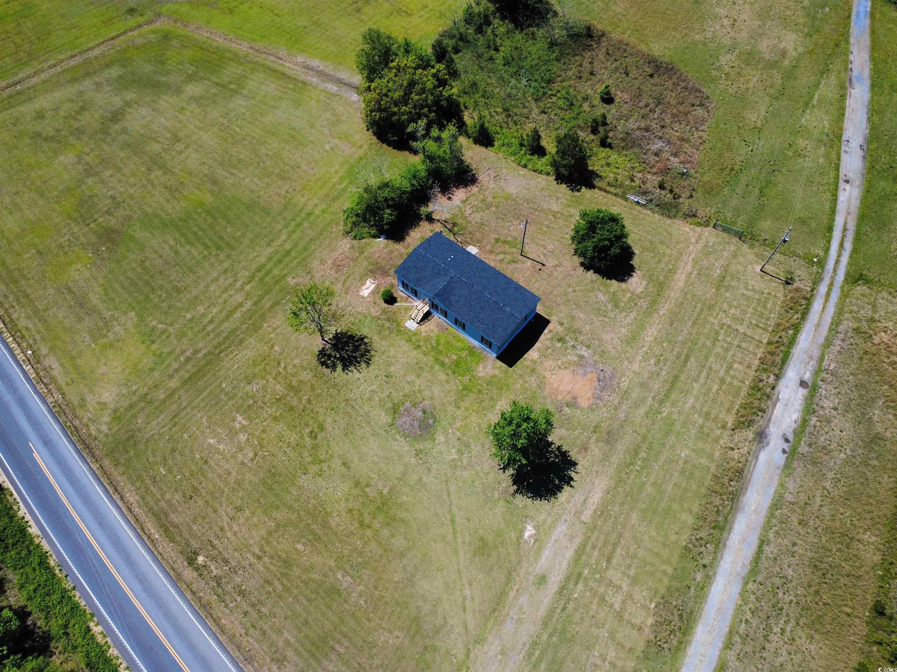111 Morrisville Road Andrews, SC 29510 - Photo 27 of 28 Drone / aerial view with a rural view