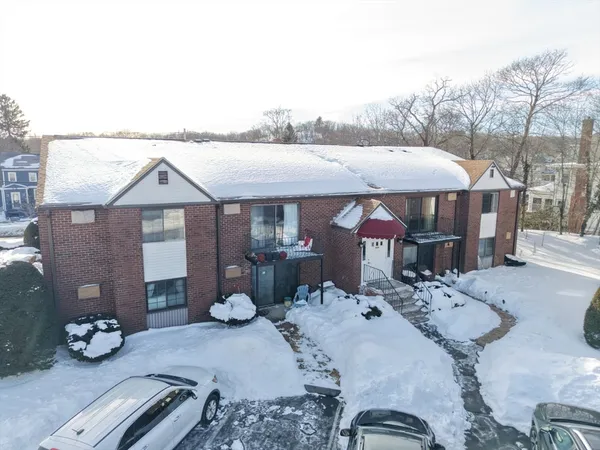 a front view of a house with patio