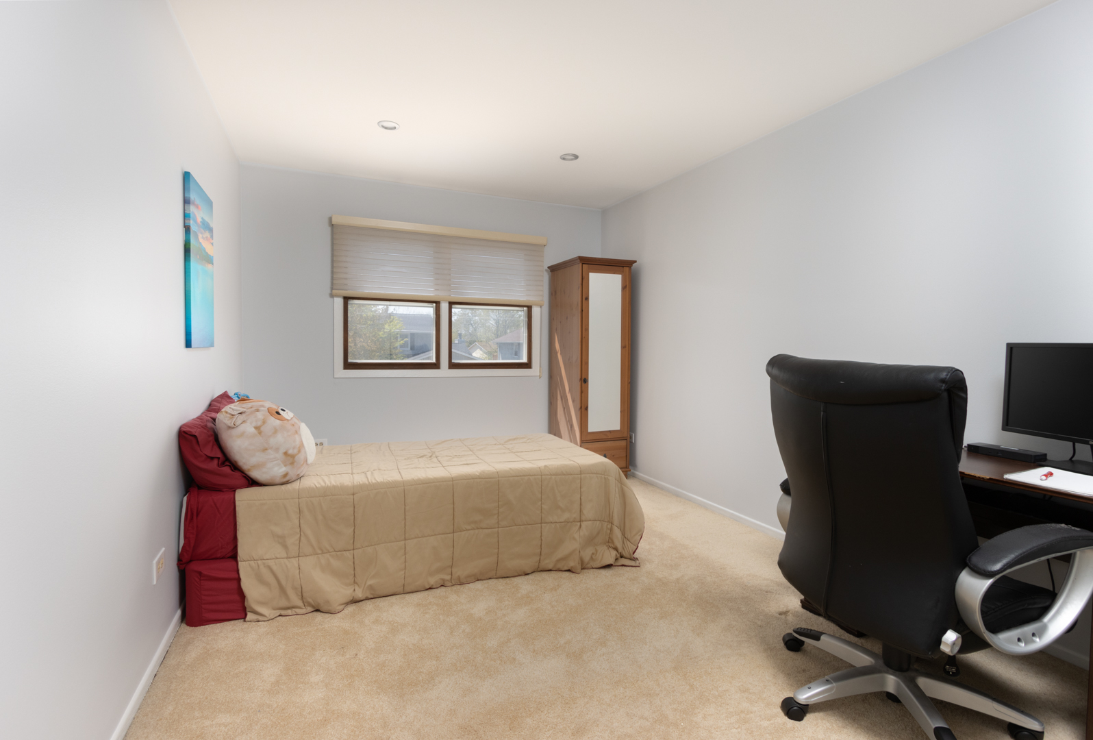 845 Deerpath Lane Hoffman Estates, IL 60169 - Photo 12 of 27 a bedroom with a bed and chair