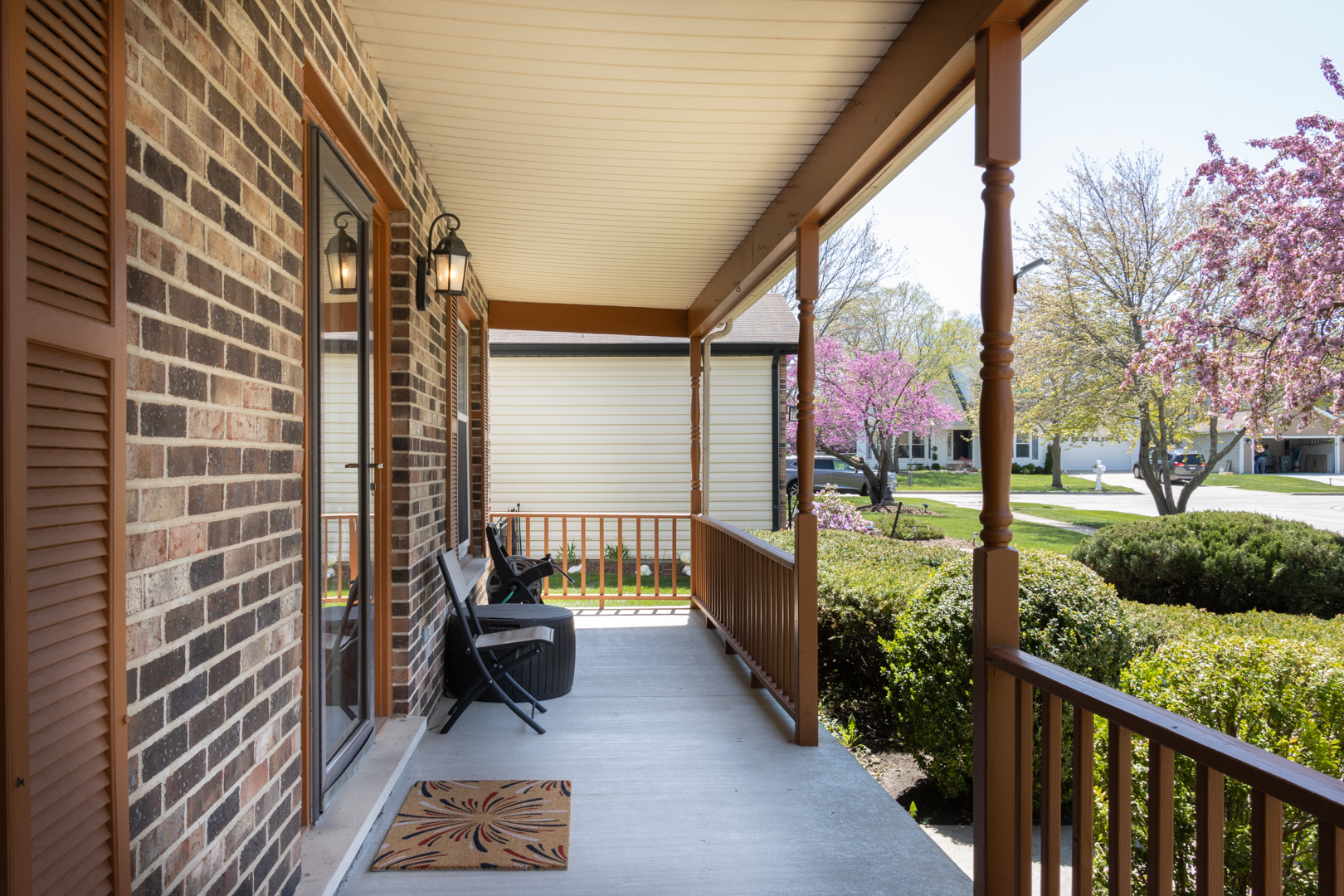 845 Deerpath Lane Hoffman Estates, IL 60169 - Photo 2 of 27 a view of a porch with furniture and garden