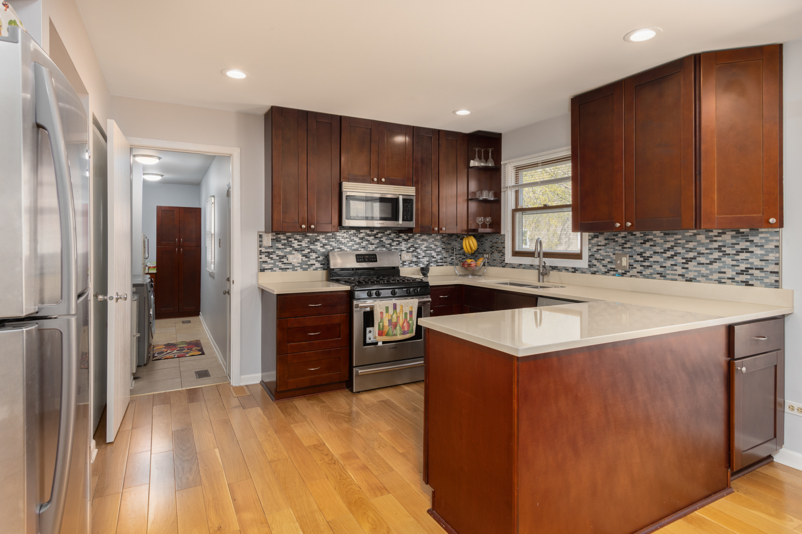 845 Deerpath Lane Hoffman Estates, IL 60169 - Photo 4 of 27 a kitchen with a sink stove and cabinets