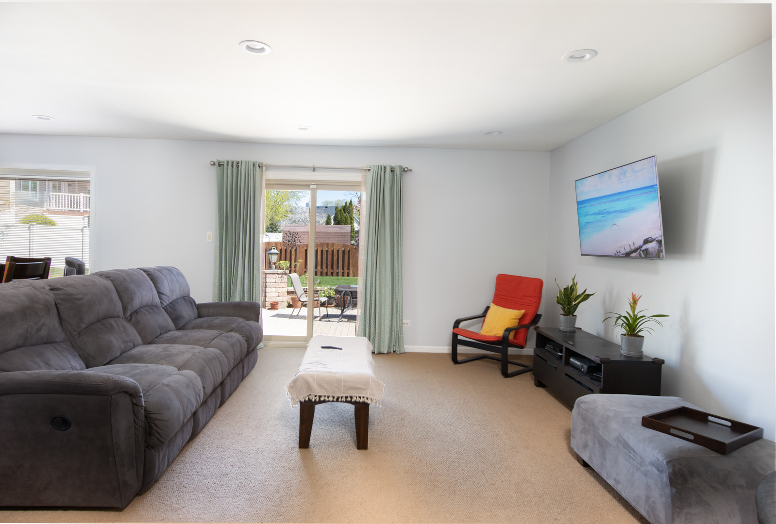 845 Deerpath Lane Hoffman Estates, IL 60169 - Photo 6 of 27 a living room with furniture and a large window