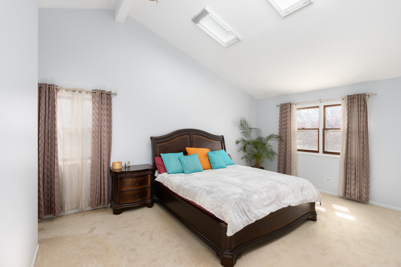 845 Deerpath Lane Hoffman Estates, IL 60169 - Photo 9 of 27 a bedroom with a bed and dresser