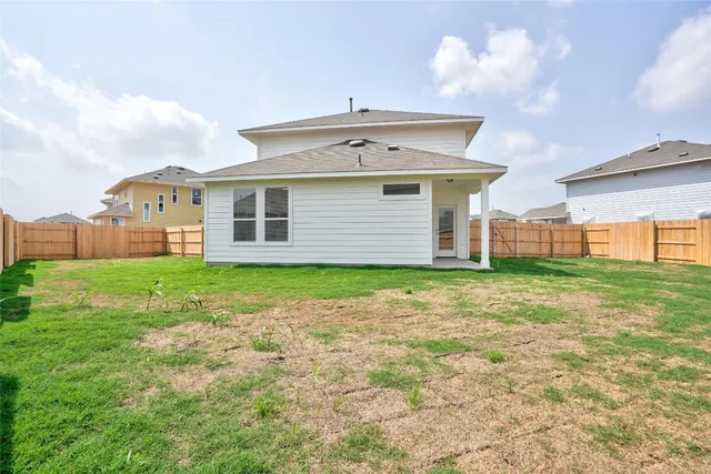 a front view of house with yard