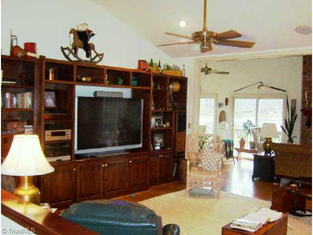 260 Cornatzer Road Mocksville, NC 27028 - Photo 7 of 9 Other. Beautiful den. Open to Florida room and view of lake. Cathedral ceiling.