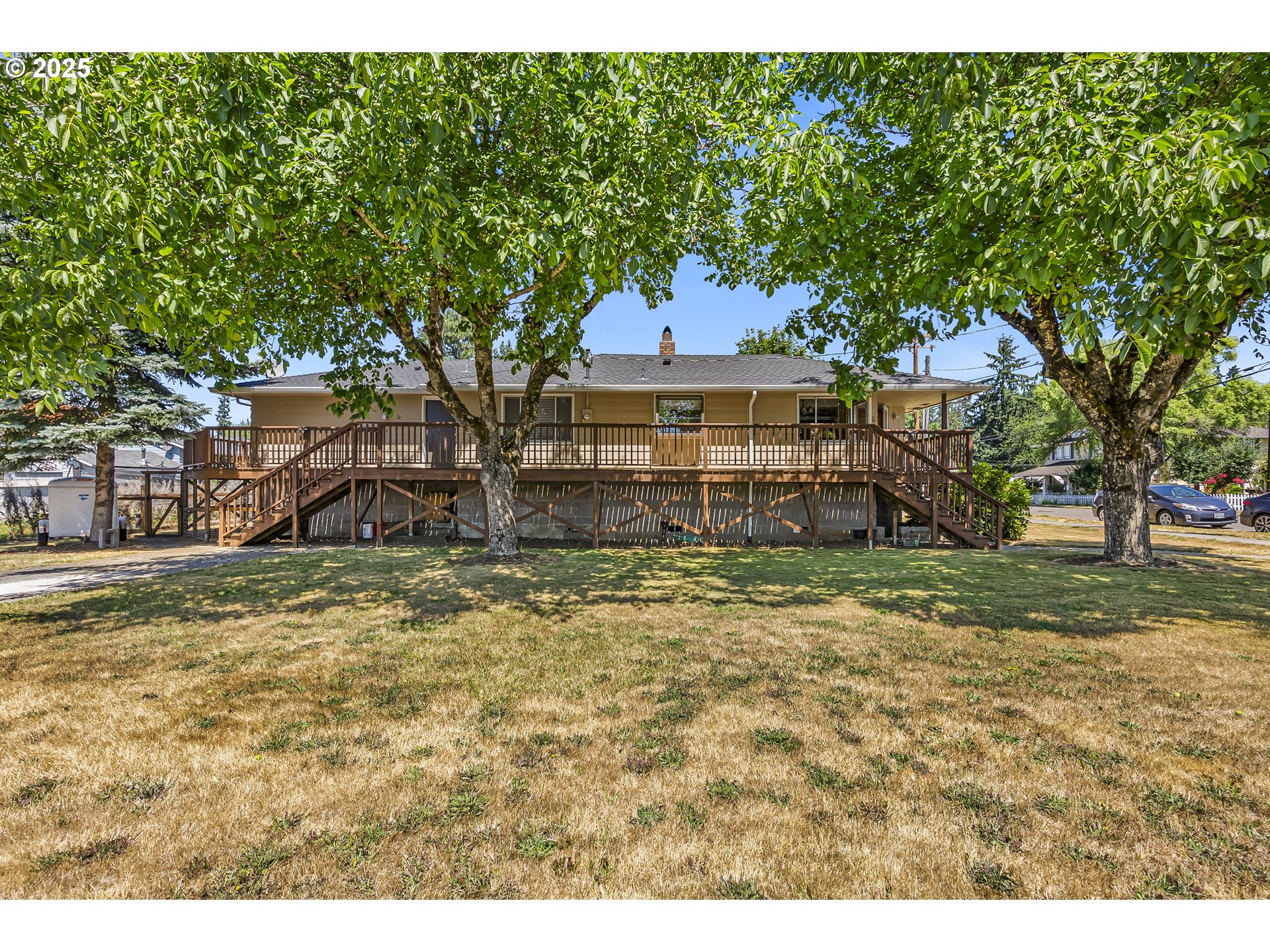 821 Bridge Street Vernonia, OR 97064 - Photo 5 of 45 a view of a house with a yard