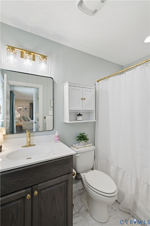 222 Oak Ridge Court Aylett, VA 23009 - Photo 20 of 35 Bathroom featuring a dark wood-finish vanity with