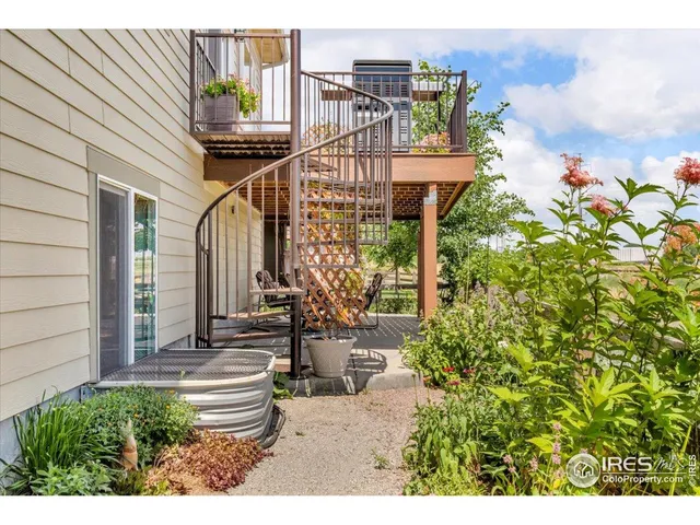 a view of a house with brick walls