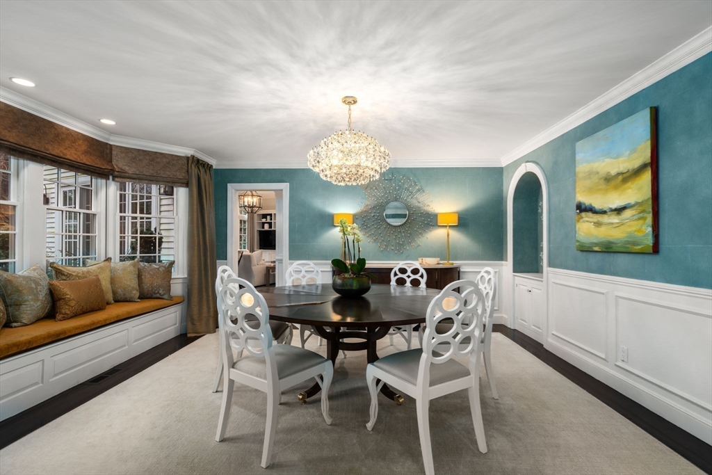 48 Scotch Pine Road Wellesley, MA 02481 - Photo 15 of 39 a view of a dining room with furniture and a chandelier
