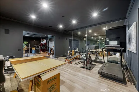 a white bath tub sitting in a bathroom next to a window