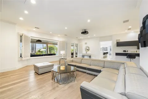 a kitchen with a sink and a refrigerator