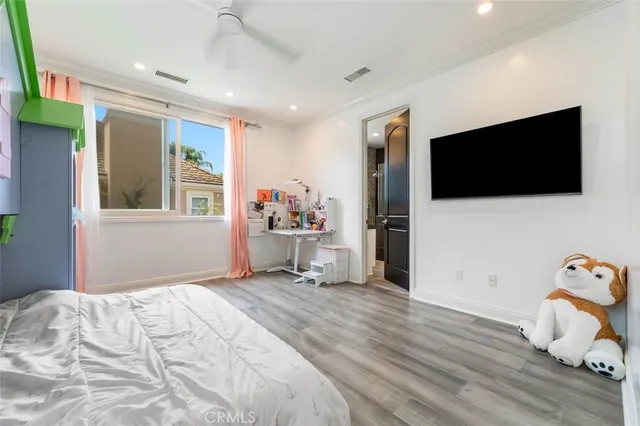 a bathroom with a bathtub a sink a toilet and a mirror