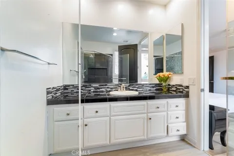 a view of a swimming pool with lounge chair