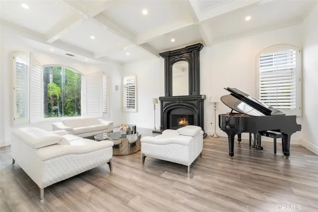 a kitchen with a table chairs sink and cabinets