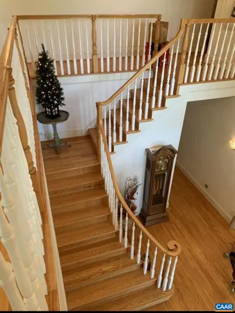 a view of entryway with wooden floor