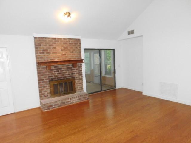 1710 Pine Road Marietta, GA 30062 - Photo 11 of 23 an empty room with fireplace