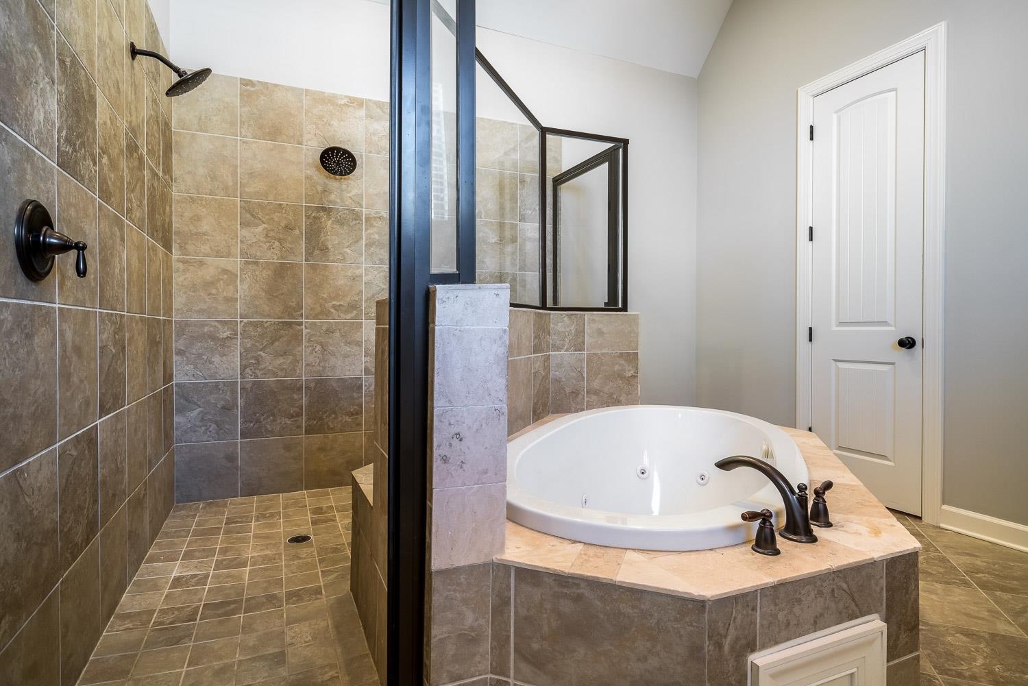 1280 Mountain Side Drive Collierville, TN 38017 - Photo 14 of 25 a bathroom with a tub and shower