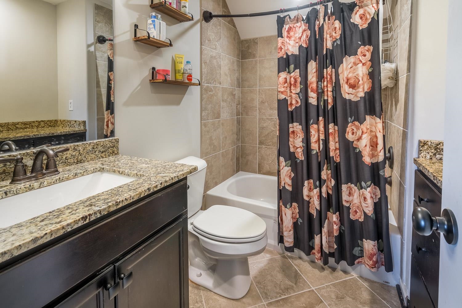 1280 Mountain Side Drive Collierville, TN 38017 - Photo 19 of 25 a bathroom with a granite countertop sink toilet and shower