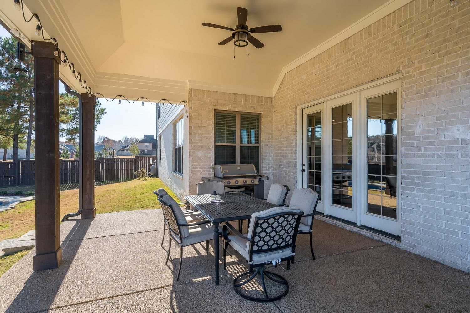 1280 Mountain Side Drive Collierville, TN 38017 - Photo 24 of 25 a dining room with furniture and a floor to ceiling window