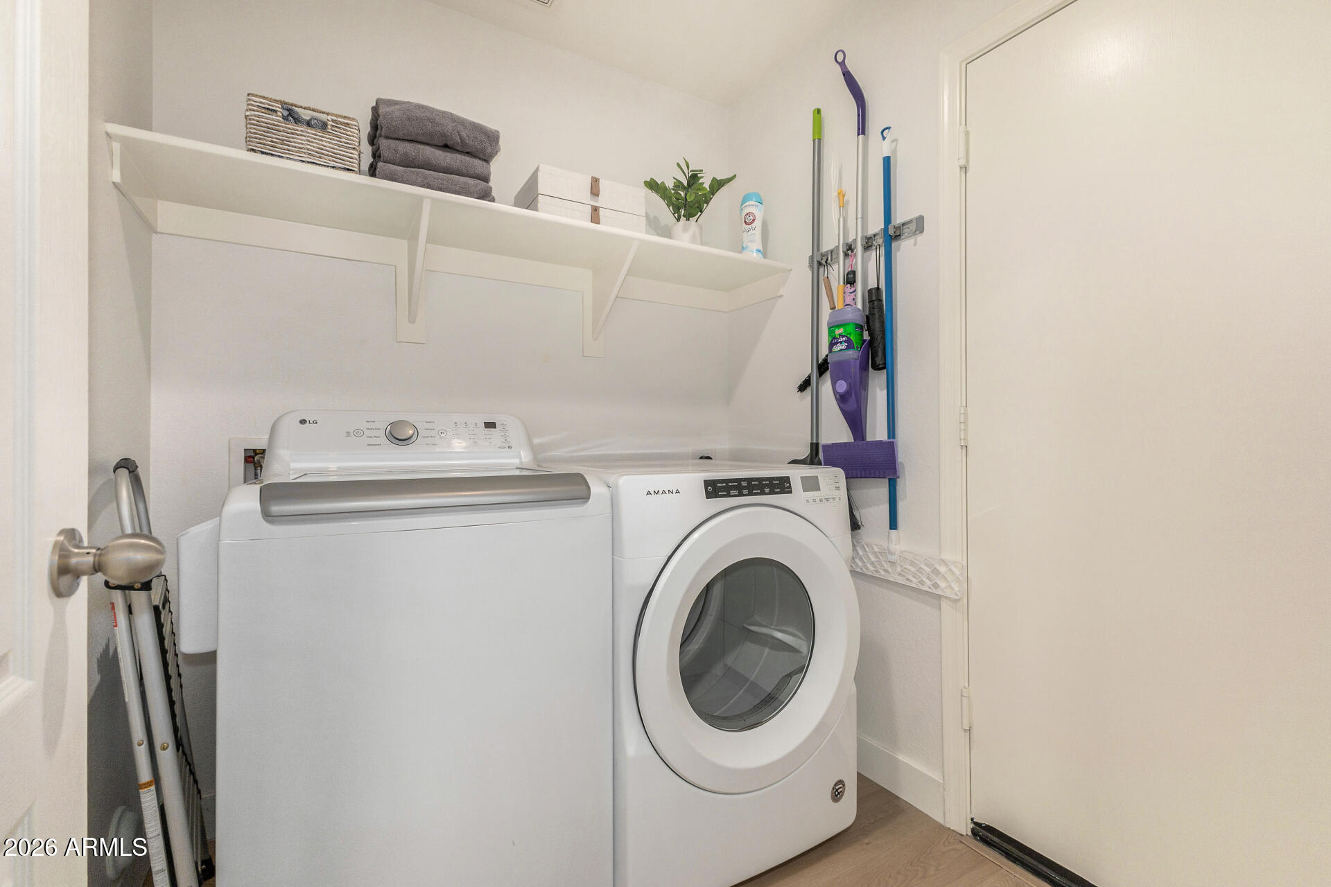 2725 East Mine Creek Road, Unit 1101 Phoenix, AZ 85024 - Photo 26 of 43 a utility room with dryer and washer