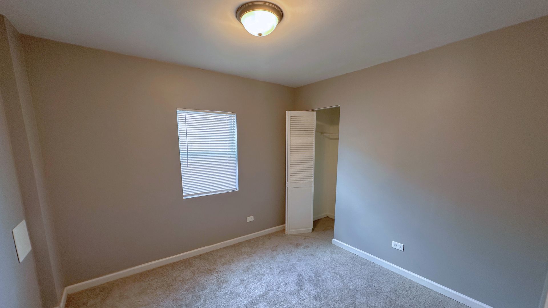 11628 South Church Street Chicago, IL 60643 - Photo 5 of 14 an empty room with windows