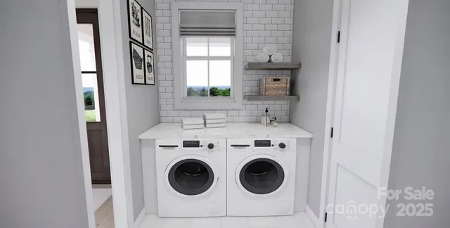 a utility room with dryer and washer