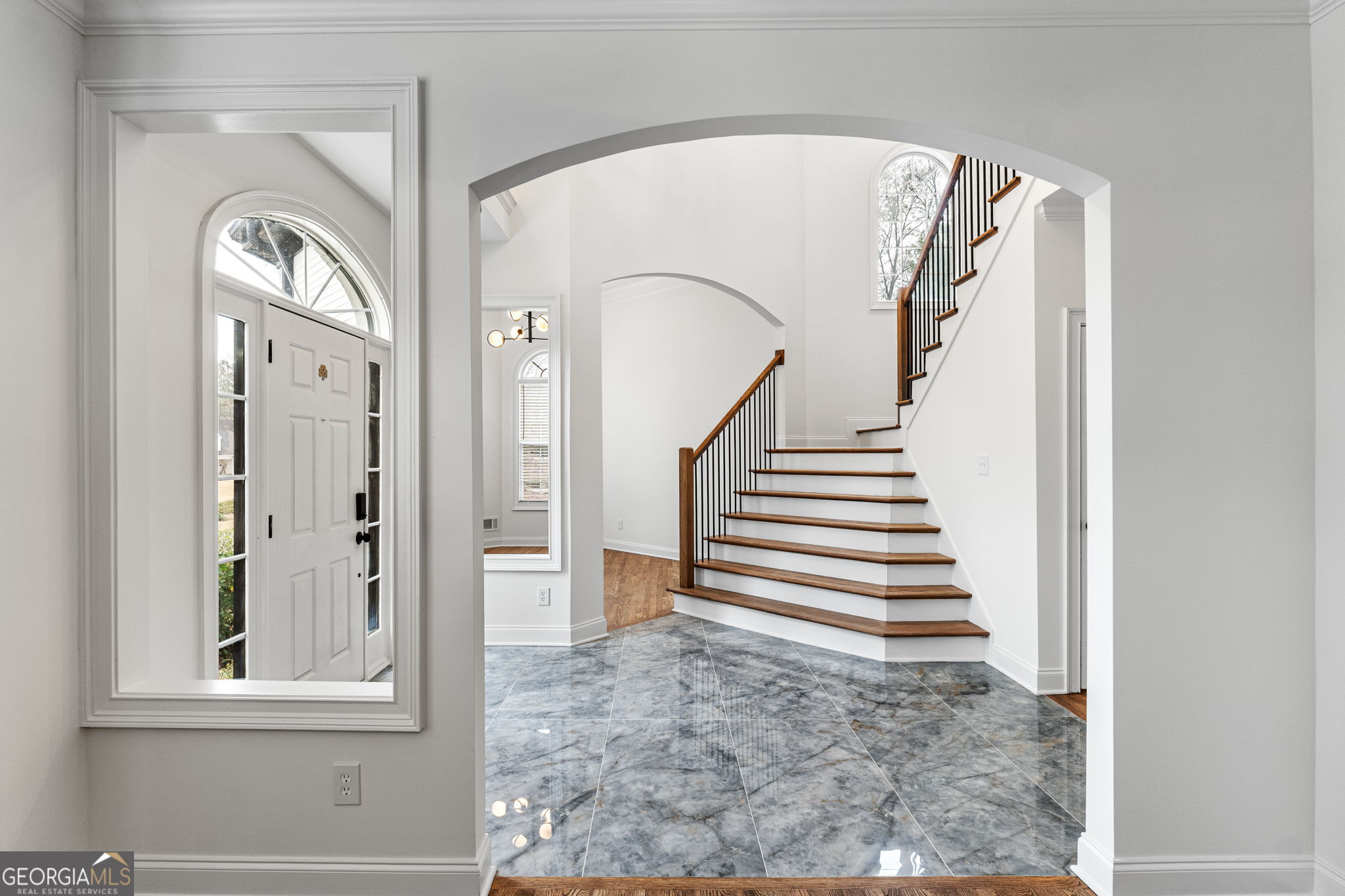 280 Antebellum Way Fayetteville, GA 30215 - Photo 16 of 65 a view of a hallway with entryway wooden floor and front door