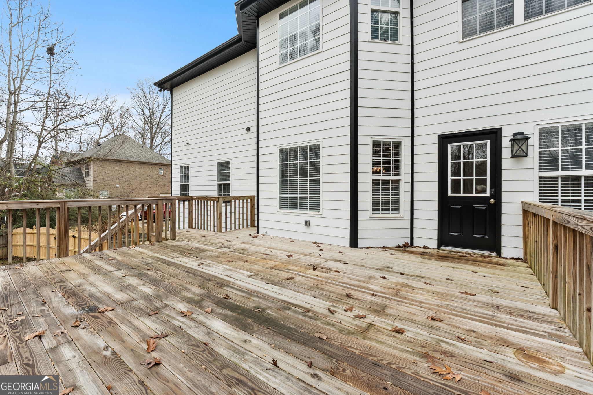280 Antebellum Way Fayetteville, GA 30215 - Photo 23 of 65 a view of a house with a wooden fence