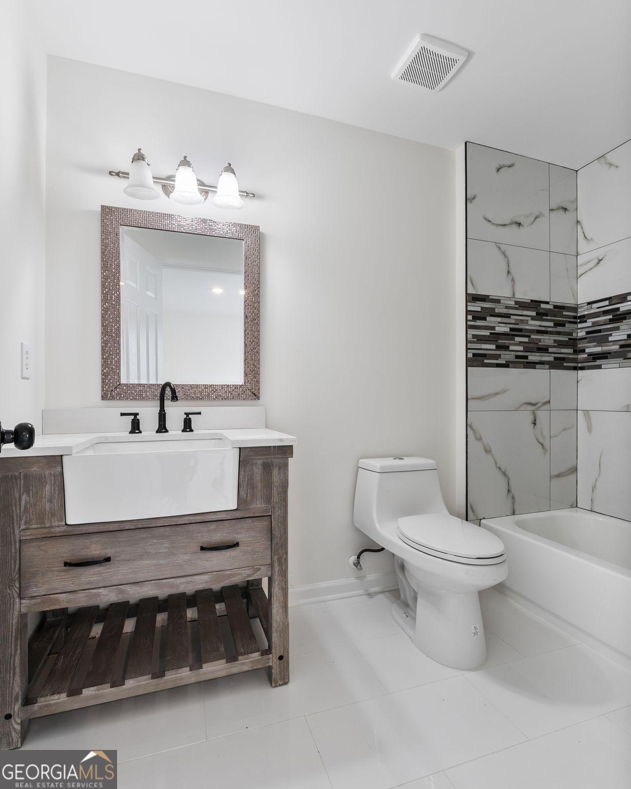 280 Antebellum Way Fayetteville, GA 30215 - Photo 26 of 65 a bathroom with a sink toilet and a mirror